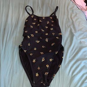 Black jolyn one piece suit with sunflowers